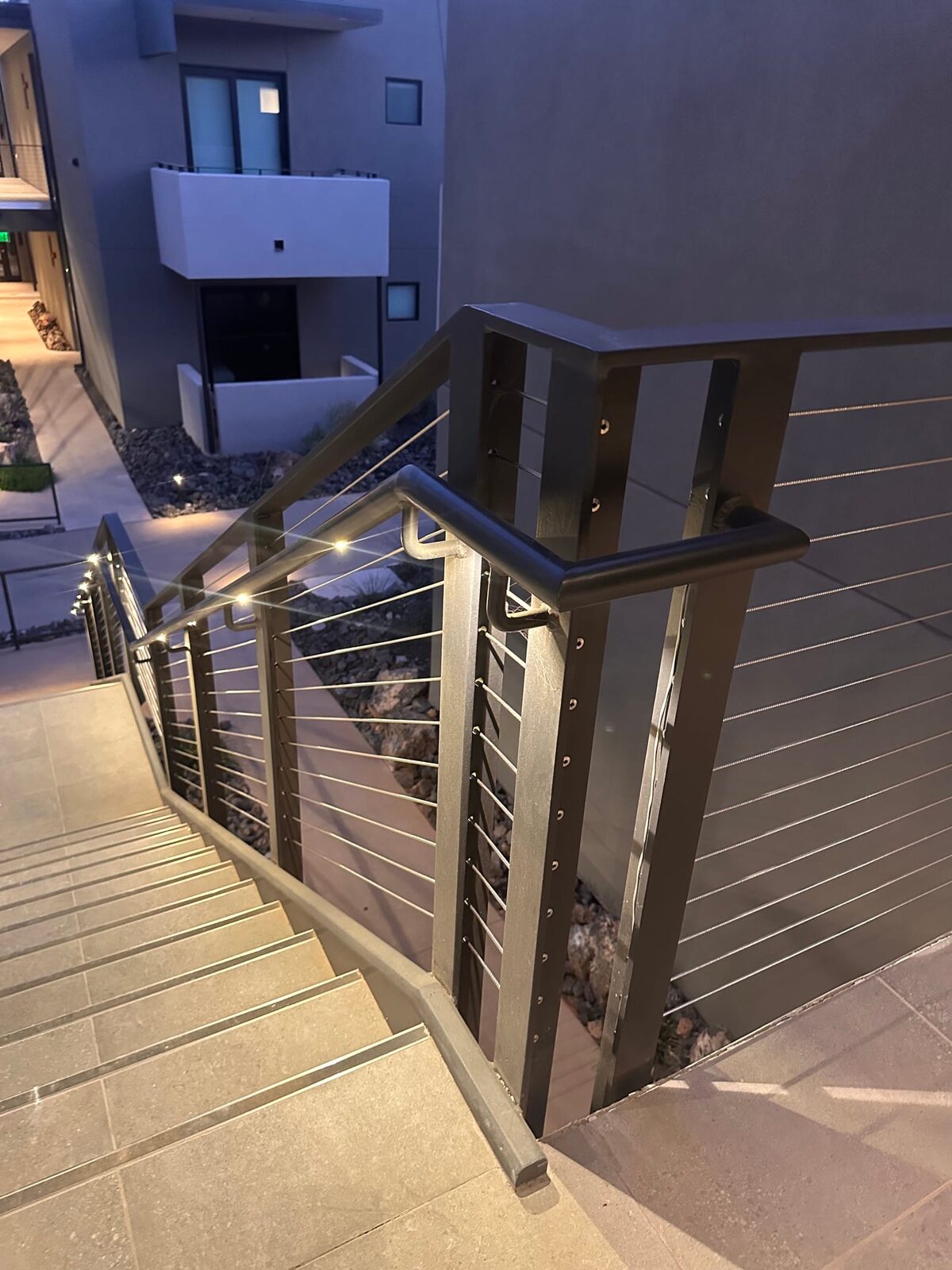 Stainless cable railing and lighted grab rail at Black Desert Resort, finished installation