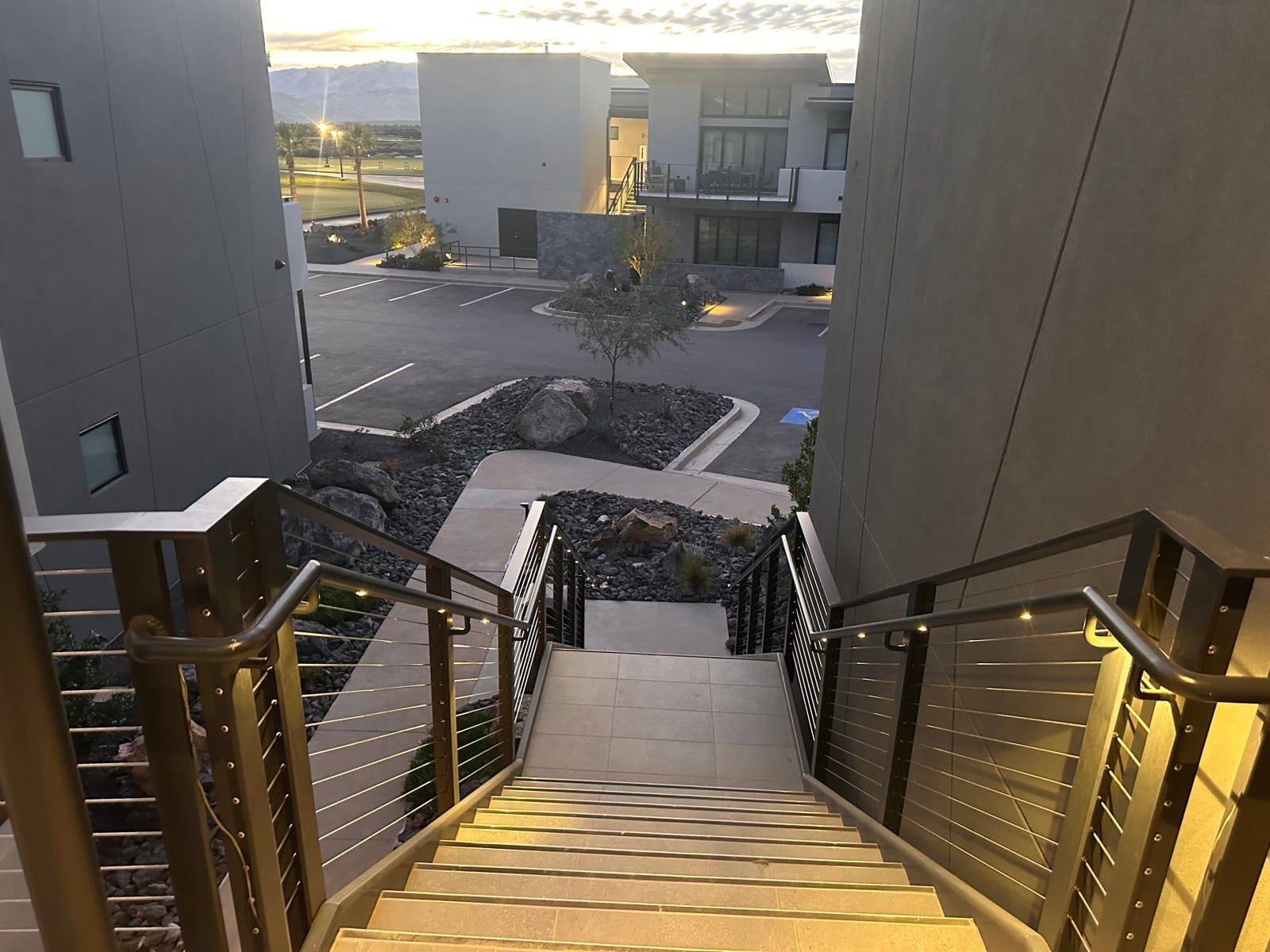 Stainless cable railing and lighted grab rail at Black Desert Resort, detail