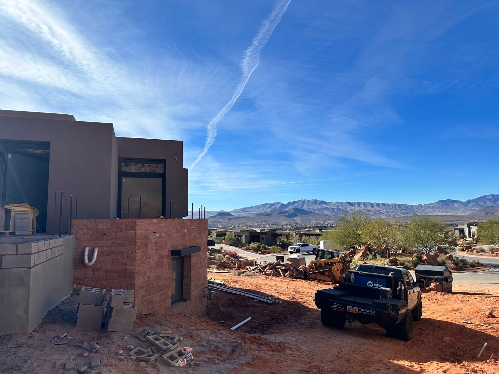 Custom radius steel railing following curved concrete at Entrada at Snow Canyon