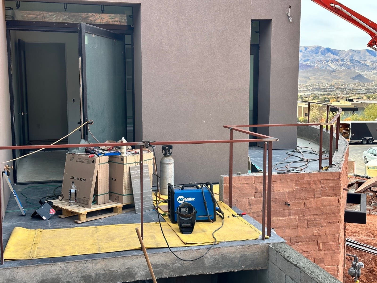 Custom radius steel railing following curved concrete at Entrada at Snow Canyon, detail