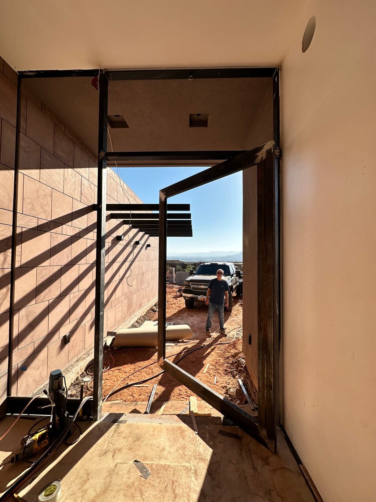 Custom steel grand entry door fabricated for the Entrada residence, close-up