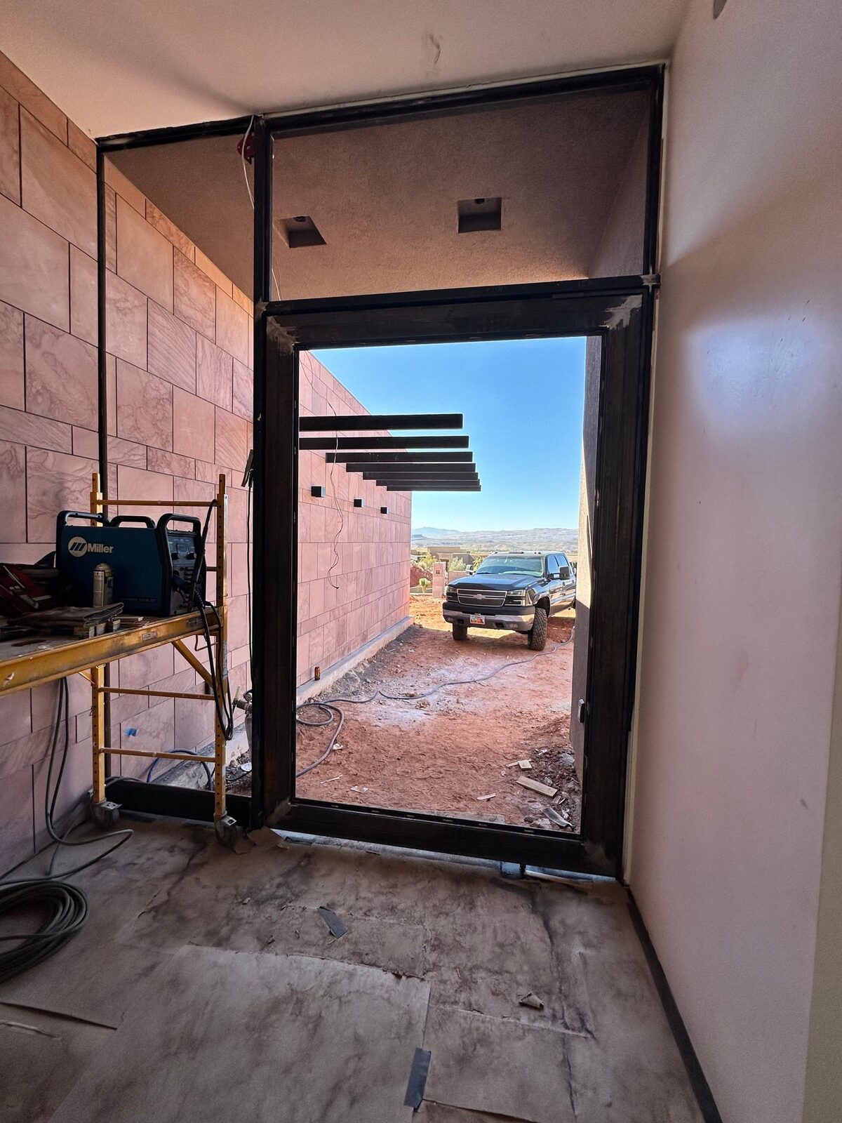 Custom steel grand entry door fabricated for the Entrada residence, close-up