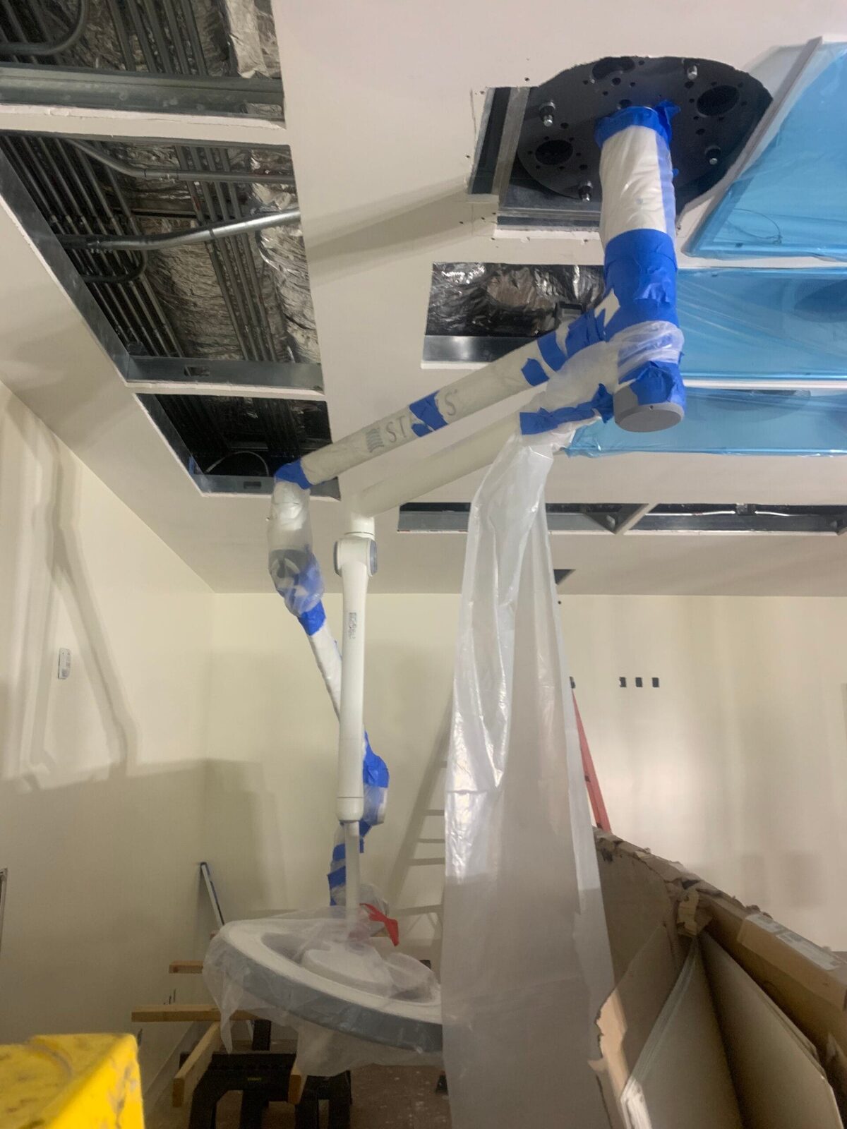 Stryker equipment plate fit to the operating-room ceiling