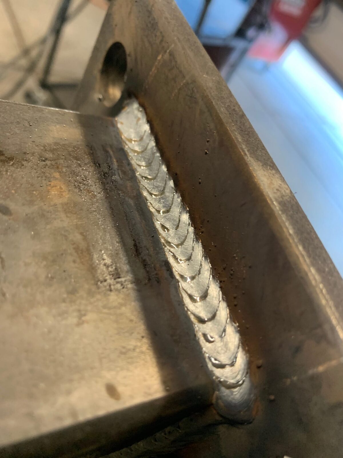 Welded mounting hardware for surgical equipment