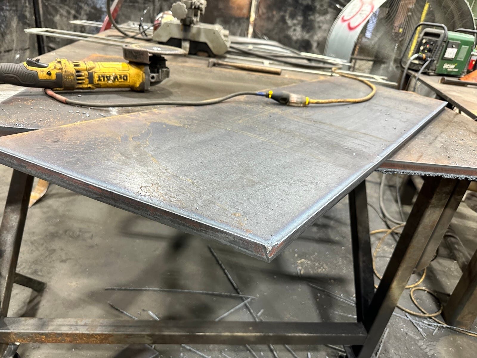 Topside fabrication of new heavy-gauge steel mine chutes and shaft supports