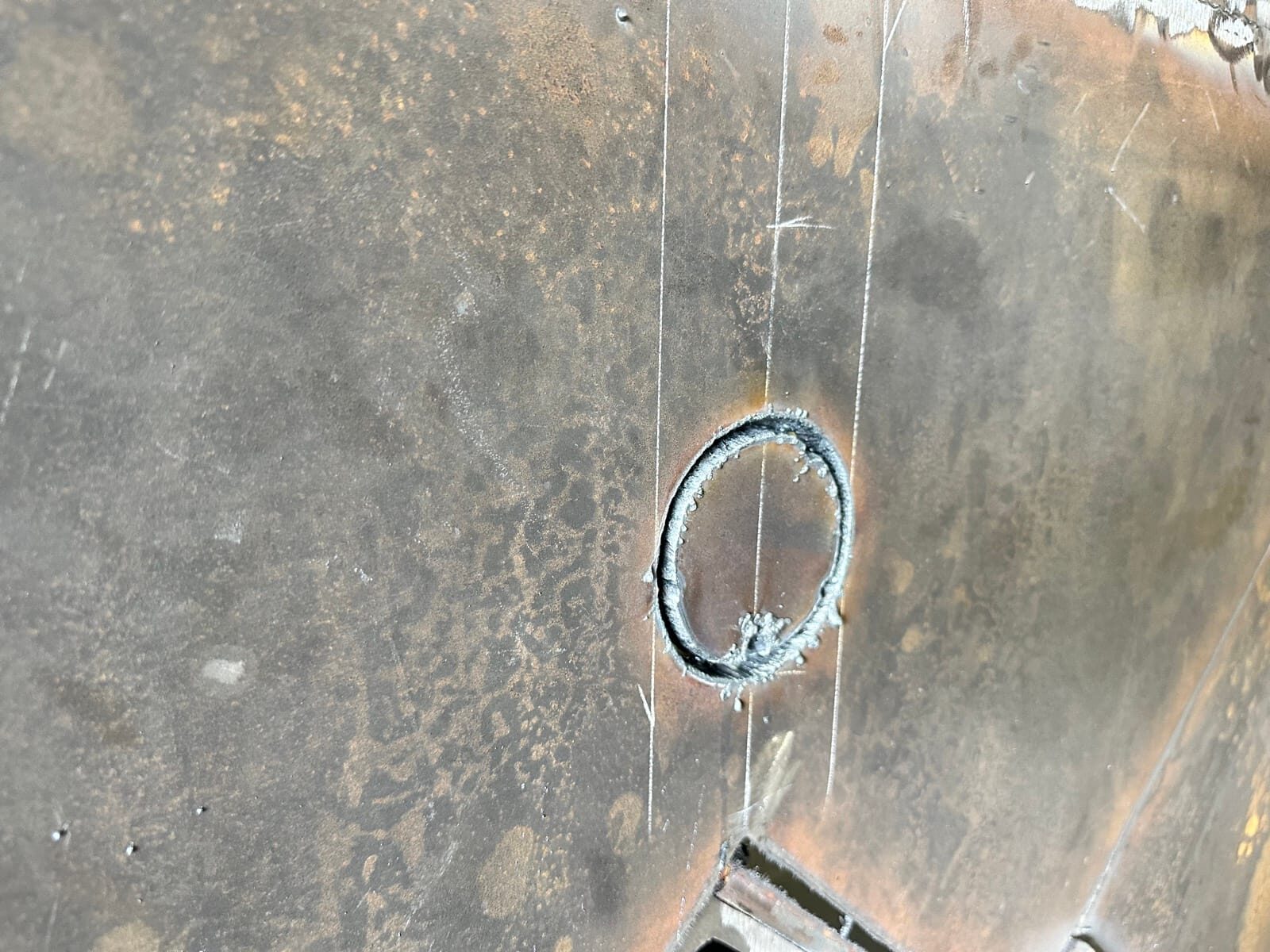 Topside fabrication of new heavy-gauge steel mine chutes and shaft supports, finished installation
