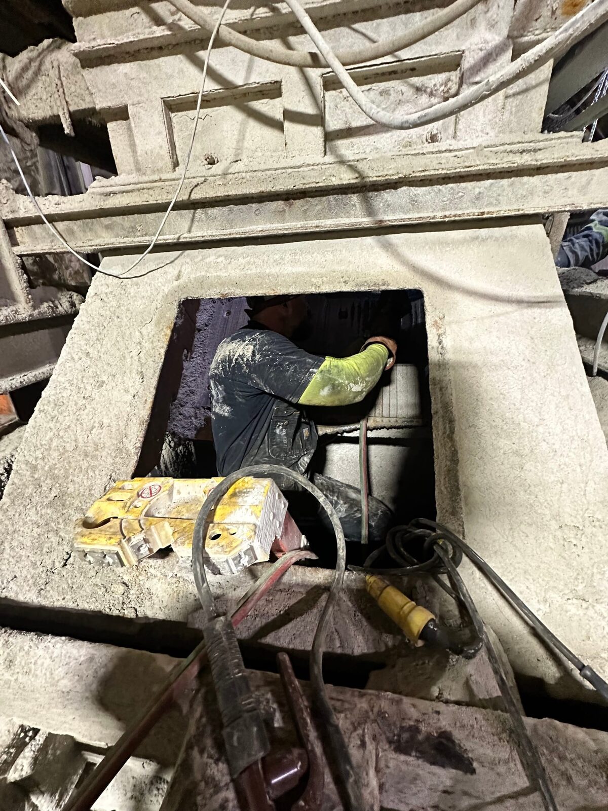 Conveyor butterfly/separator chute repair at the Cumberland zinc mine, close-up