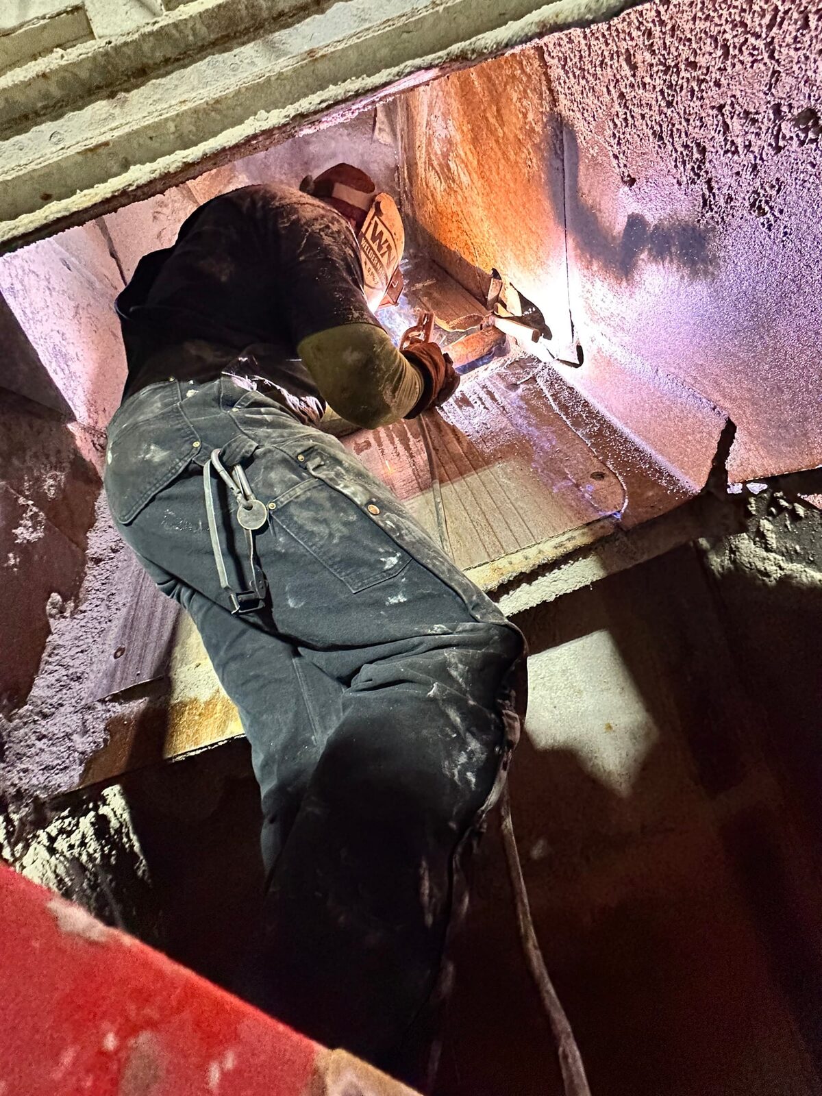 Conveyor butterfly/separator chute repair at the Cumberland zinc mine