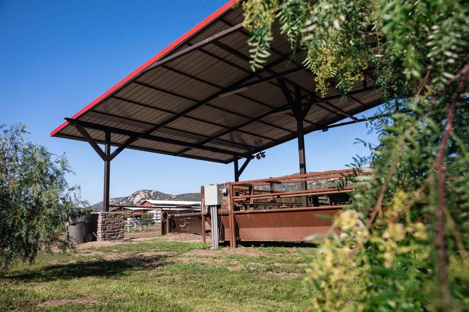 Steel I-beam covered arena and shade pavilion with tube-steel columns