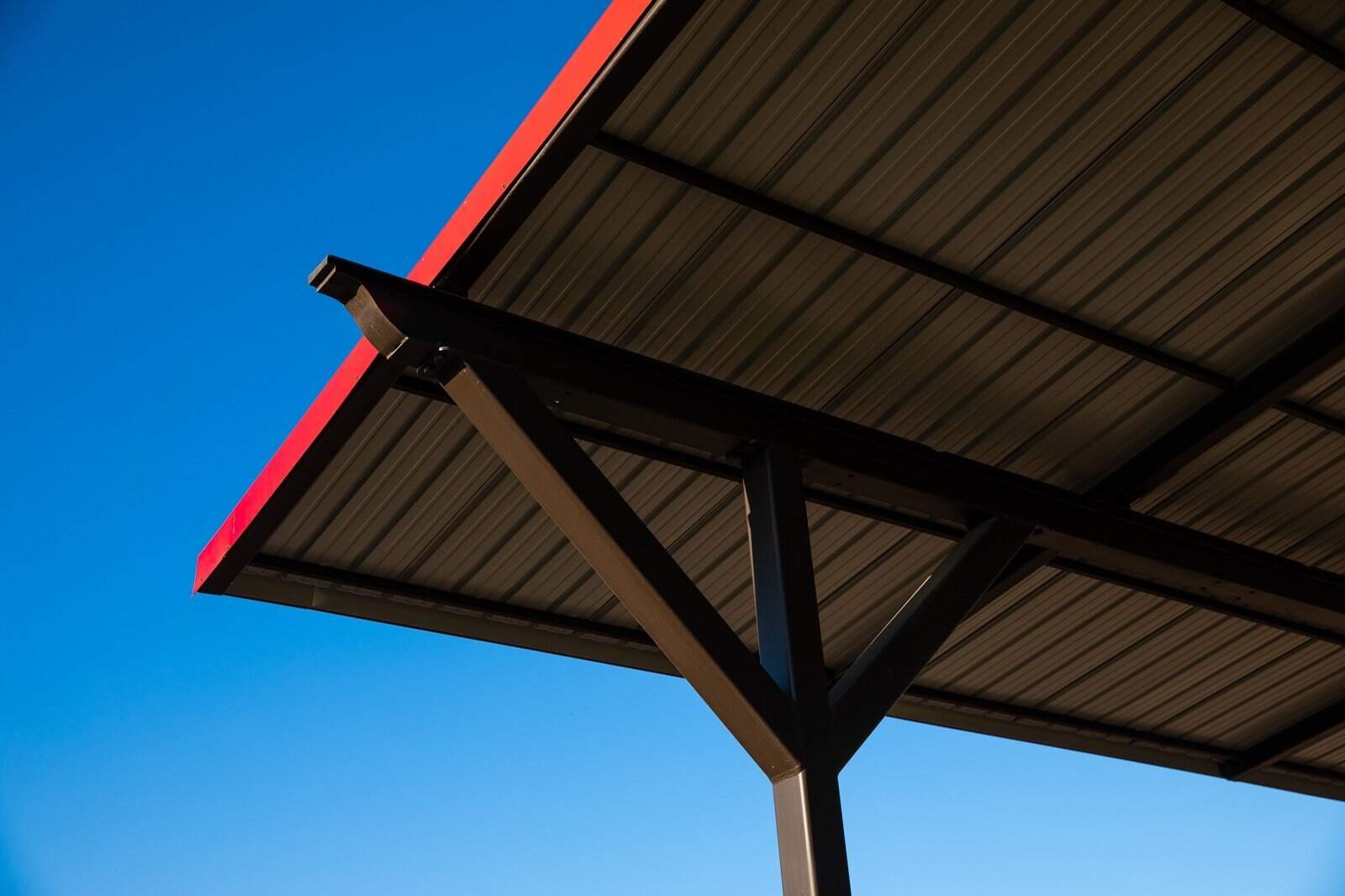 Steel I-beam covered arena and shade pavilion with tube-steel columns, finished installation