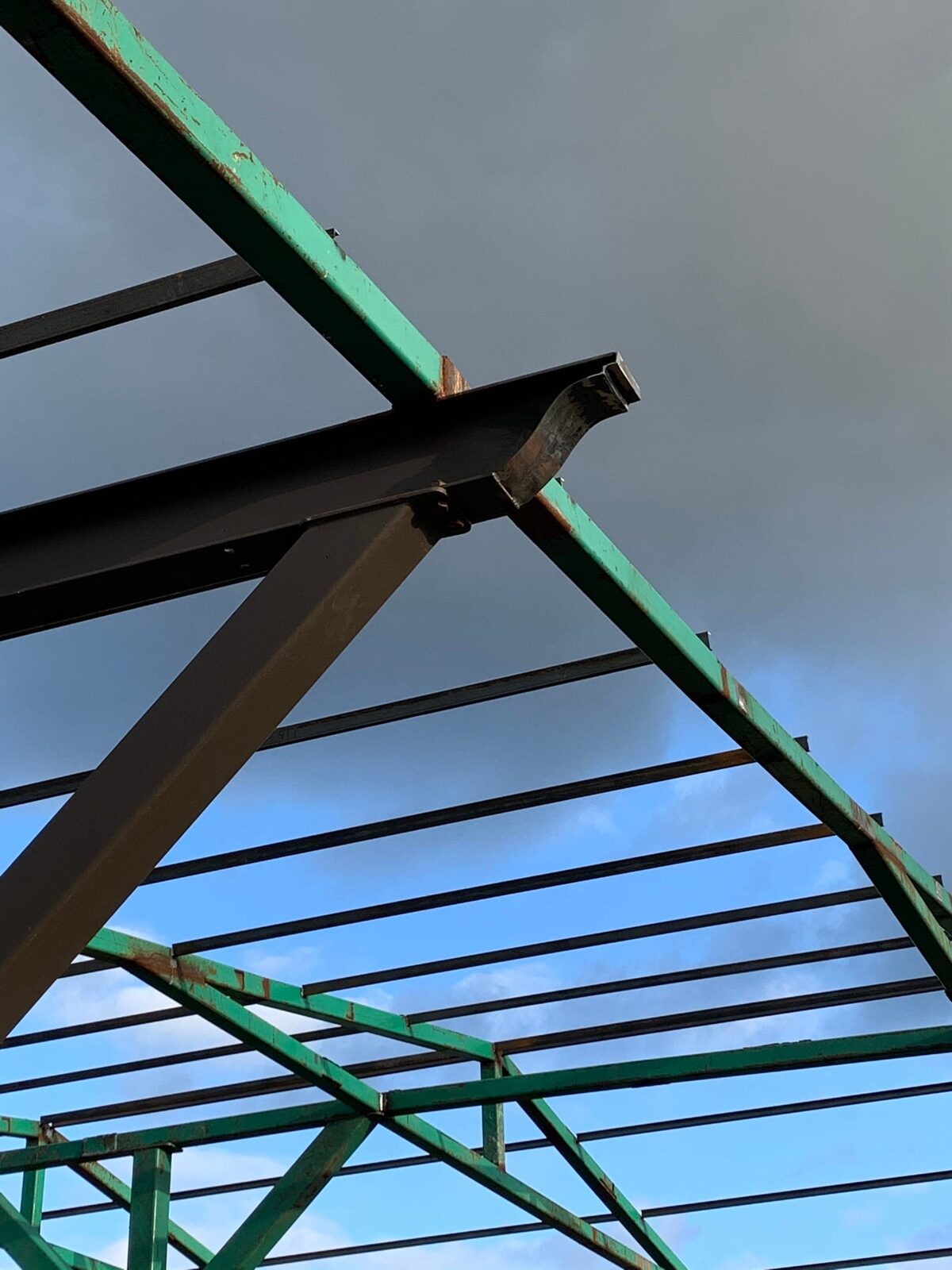Steel I-beam covered arena and shade pavilion with tube-steel columns, finished installation