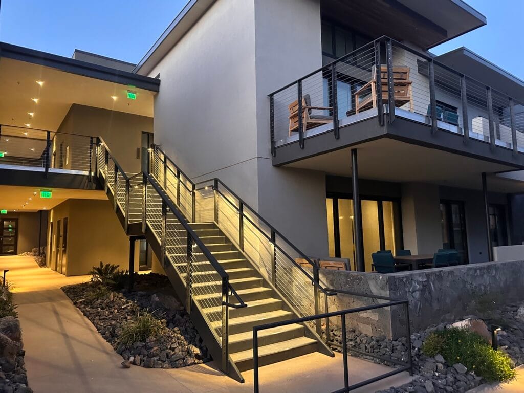 Modern home with custom metal railings and stairs